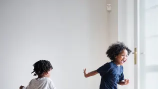Children playing around motion sensor