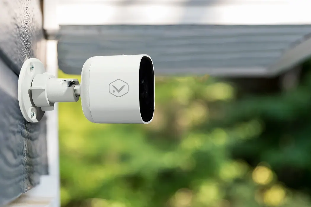 Outdoor Security Camera Mounted Near Awning—Protect Your Privacy and Learn How to Spot Hidden Cameras Pointed Inward