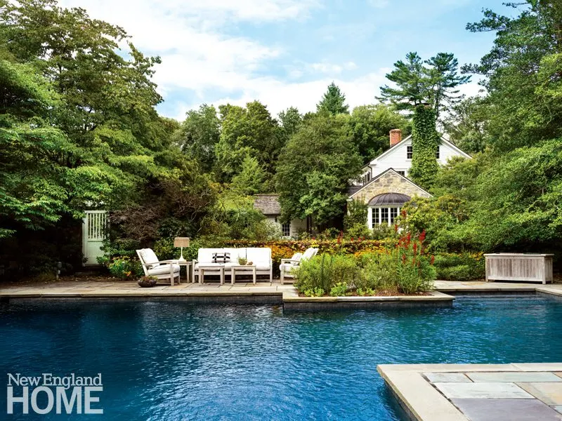 With such a pretty setting, it’s no wonder the homeowners are in no rush to leave the house where they raised their family. The stone section with its copper-roofed bay window was built in 1898. The white two-story structure, where most of the living spaces are located, is a gracious center-hall colonial that was added in the 1920s.