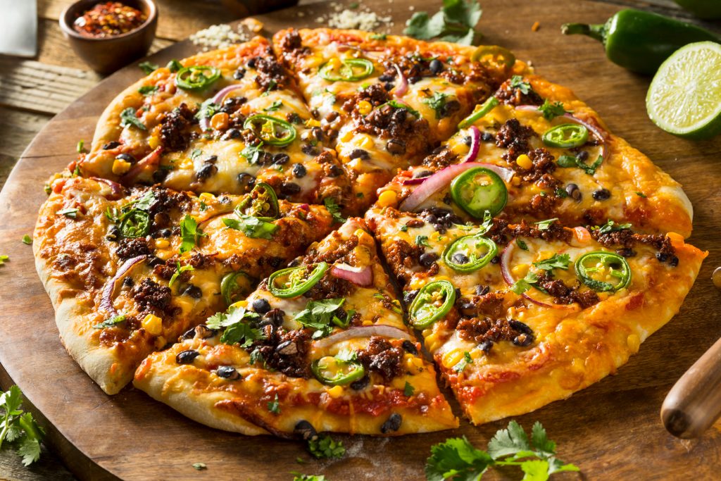 Pizza Vegetariana con Brócoli, Tomate Cherry, Pimienta y Champiñones.