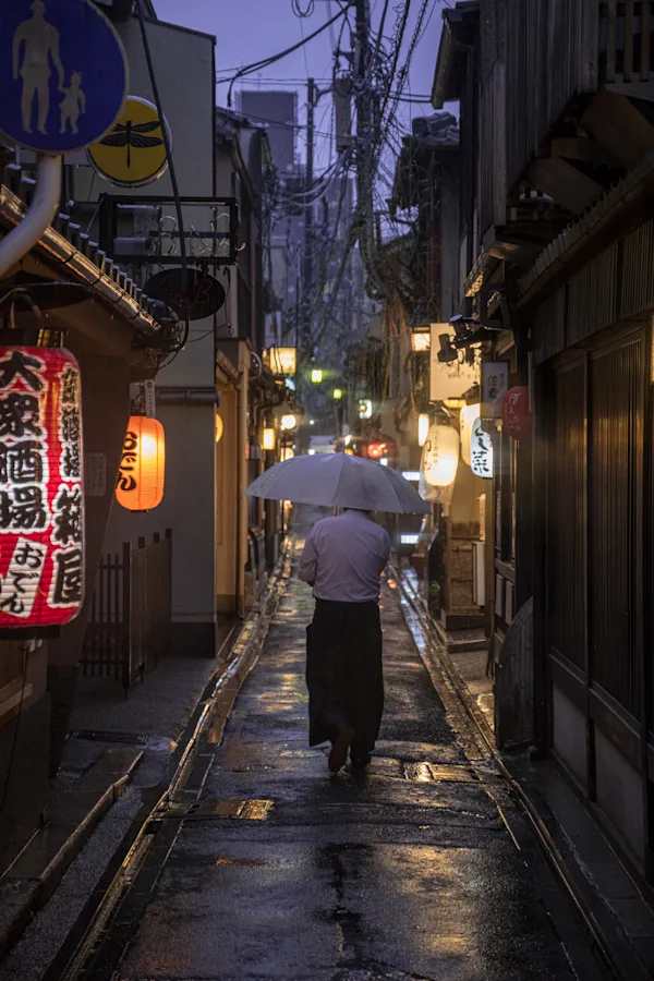 Figure with Umbrella in Kyoto Backstreet, Japan