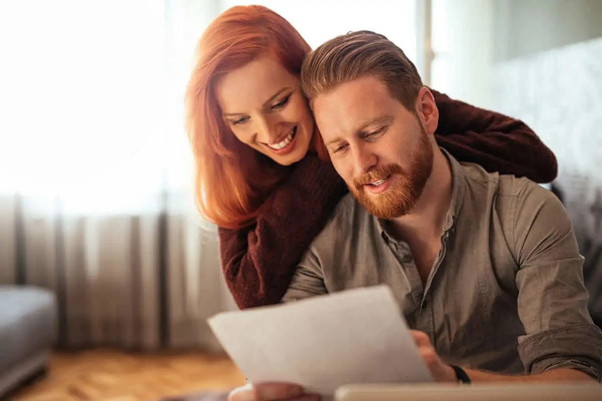 young couple working on finances