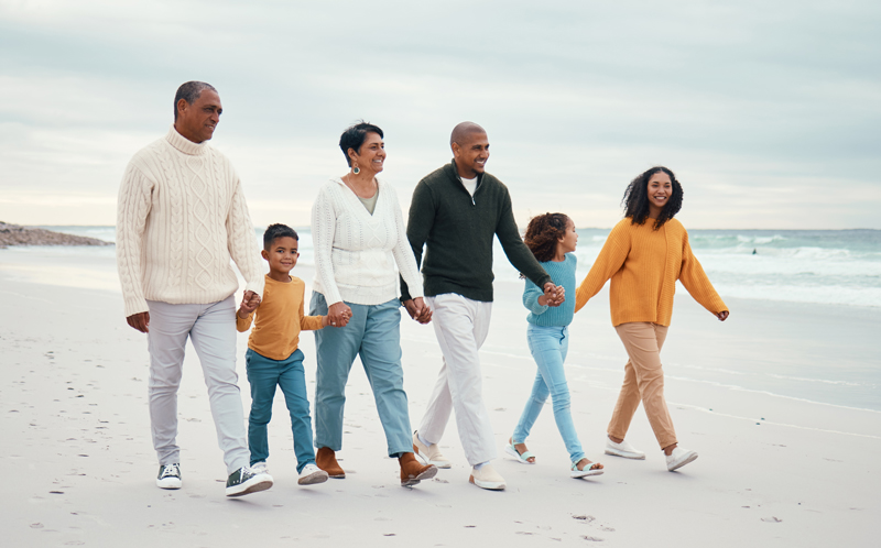 family outside on a walk and embracing