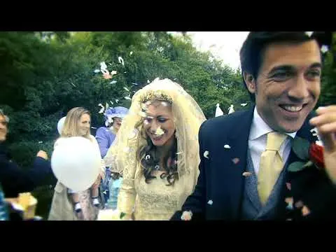 A bride and groom walking outside