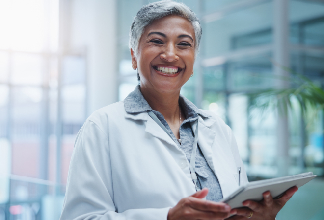 female dentist smiling at work