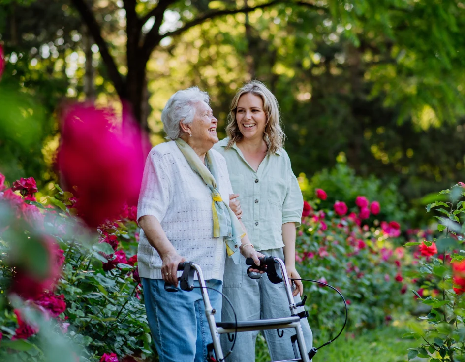 httc milestone elderly taking walk in garden for health