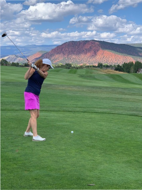 Nicole Romito golfing