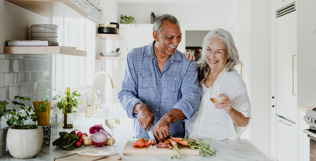 older couple cooking together