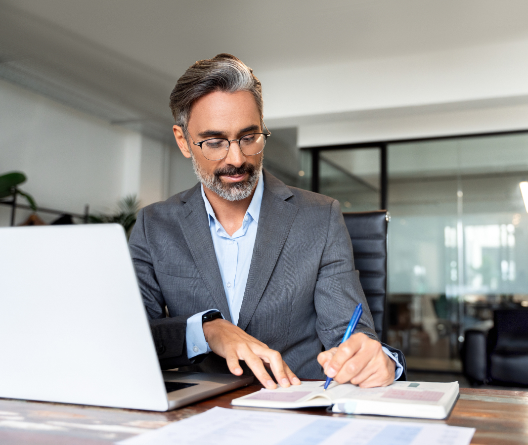 business owner working on laptop