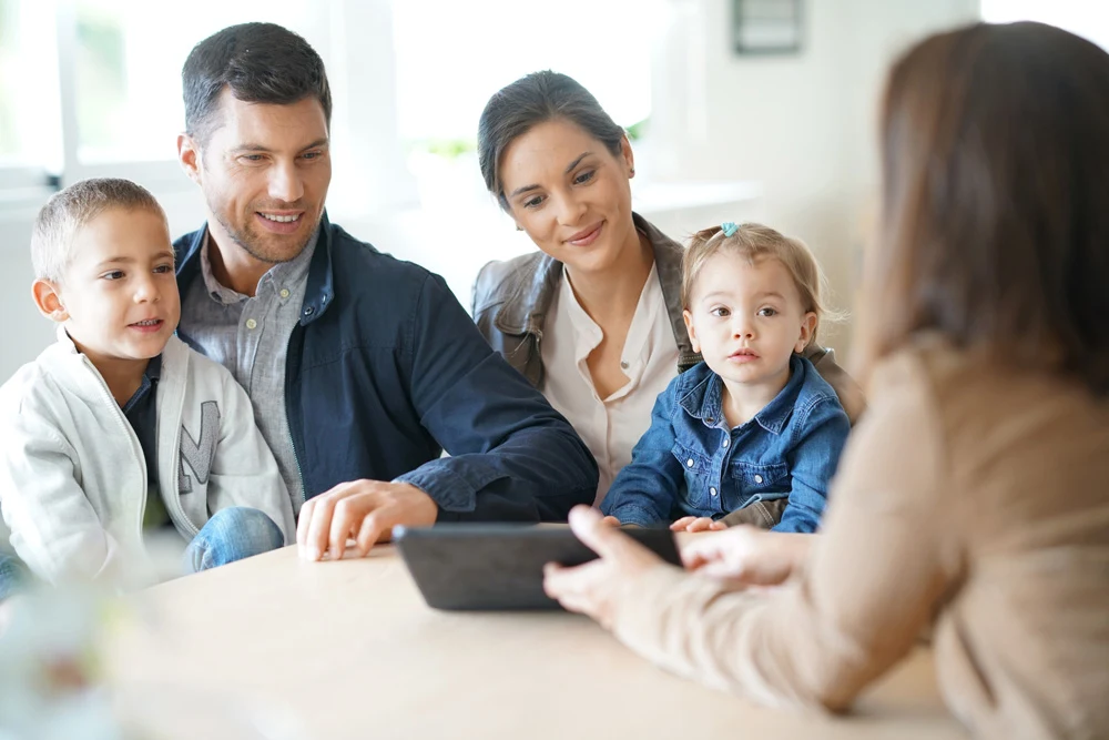 A family discussing options with an advisor