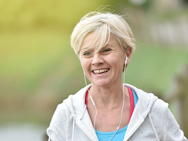 Happy woman running