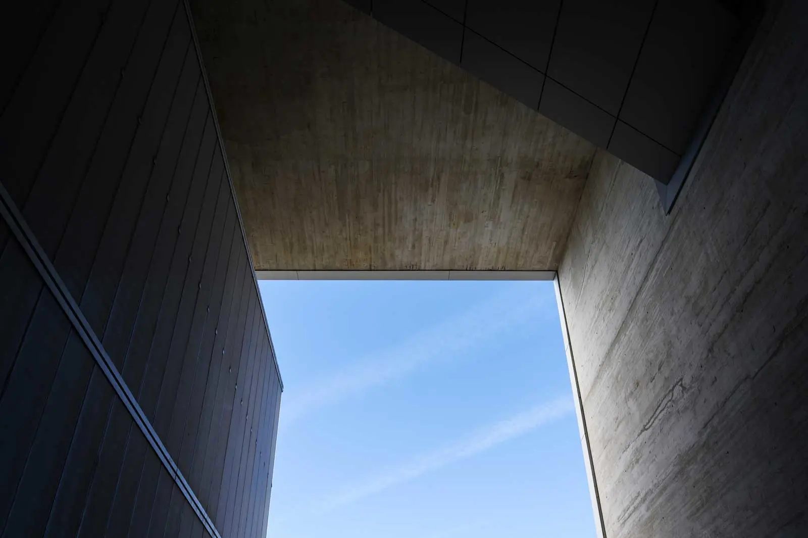 Upward view of abstract concrete architecture