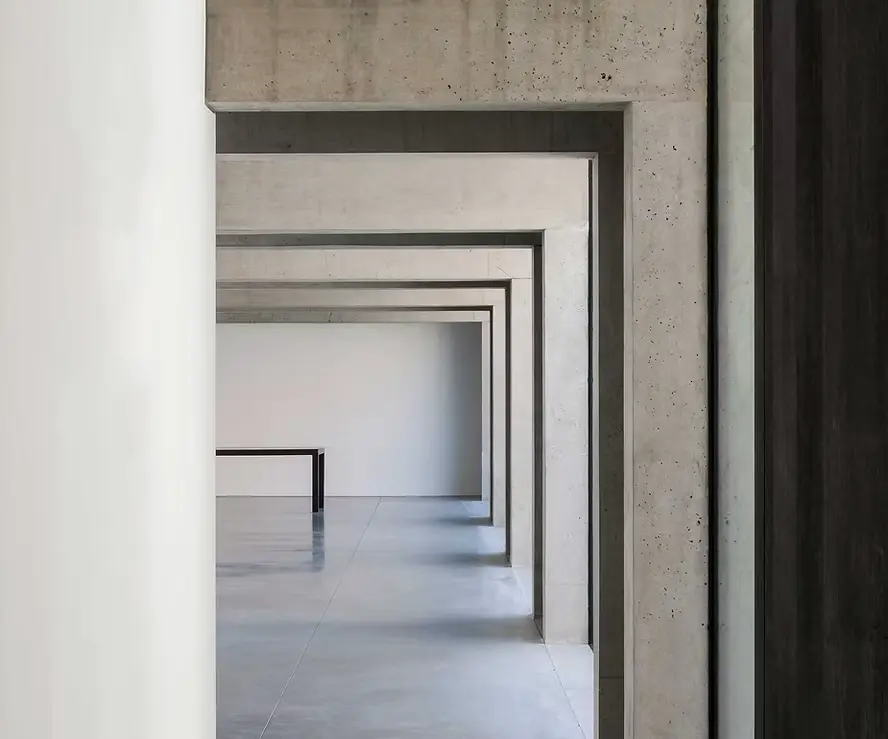Modern concrete walkway with minimalist table