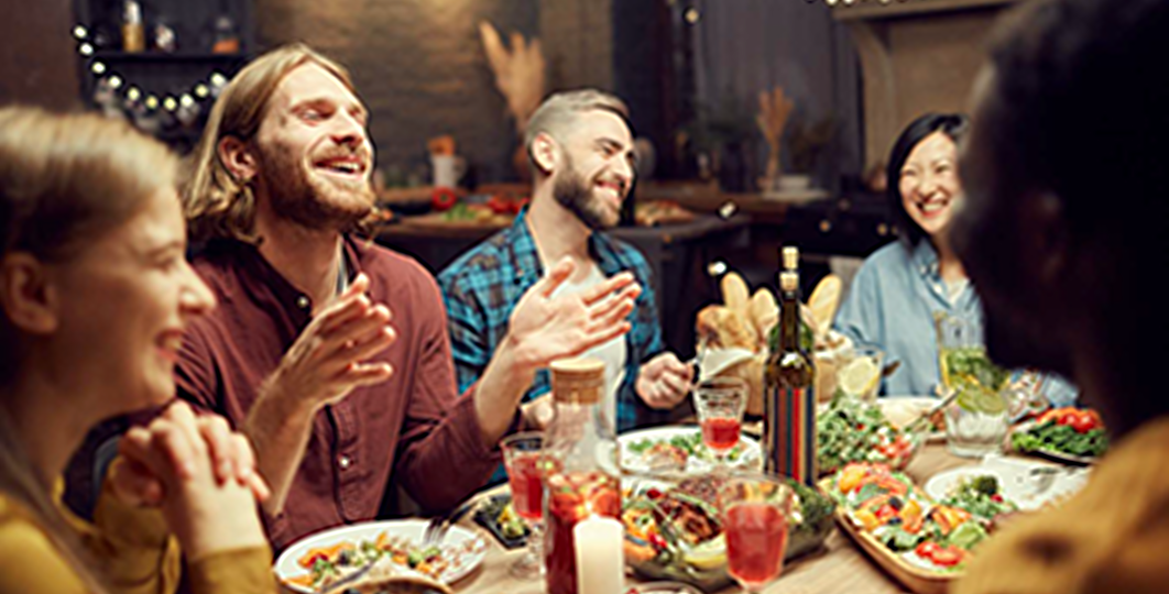 family conversing around a table