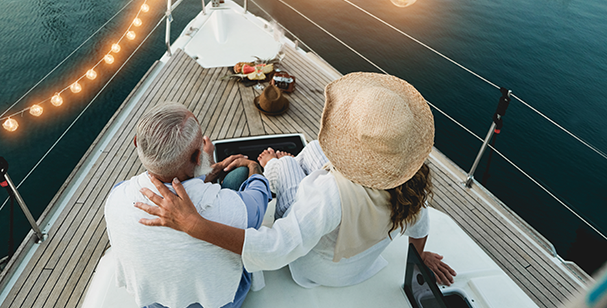 woman on a boat with husband enjoying life