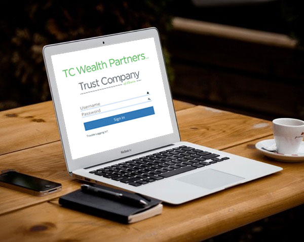 Laptop with TC Wealth Management Trust Company open window