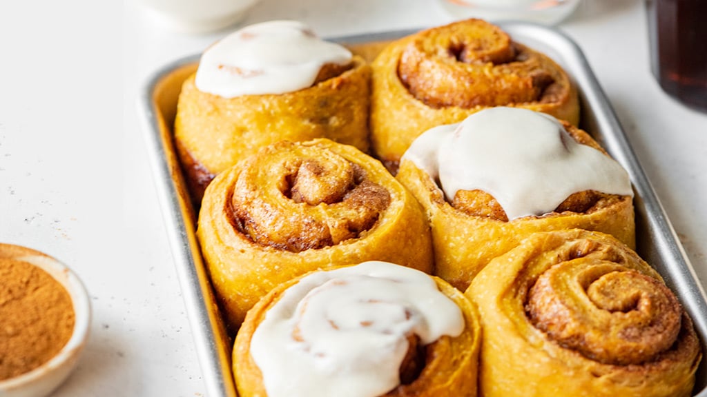 Pumpkin cinnamon rolls with icing