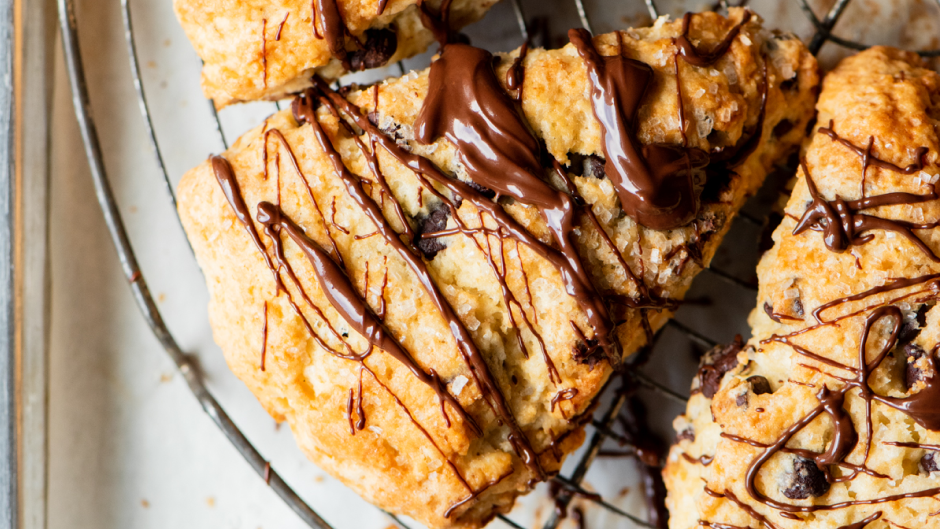 Chocolate chip scones with chocolate drizzle on top