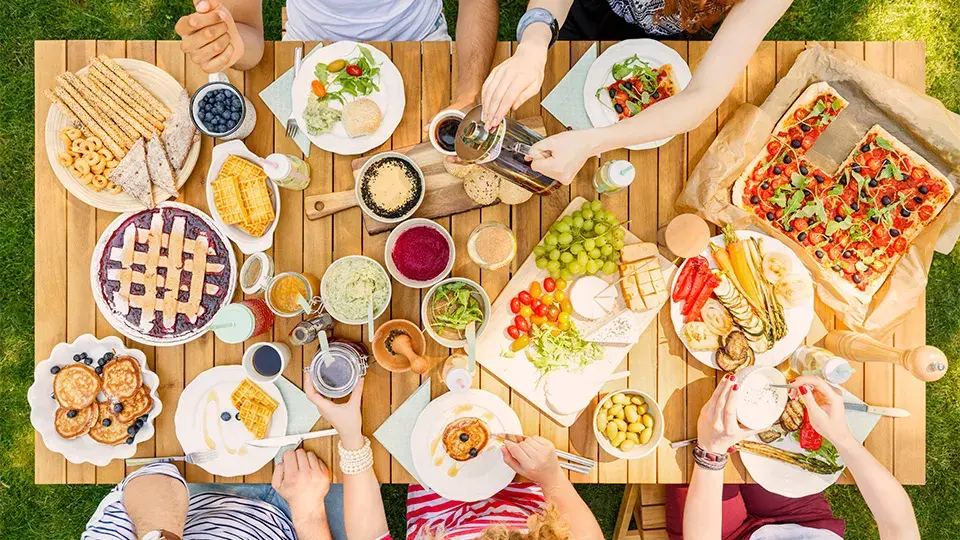 A table with a variety os pastries and meals made following LACTAID® recipes