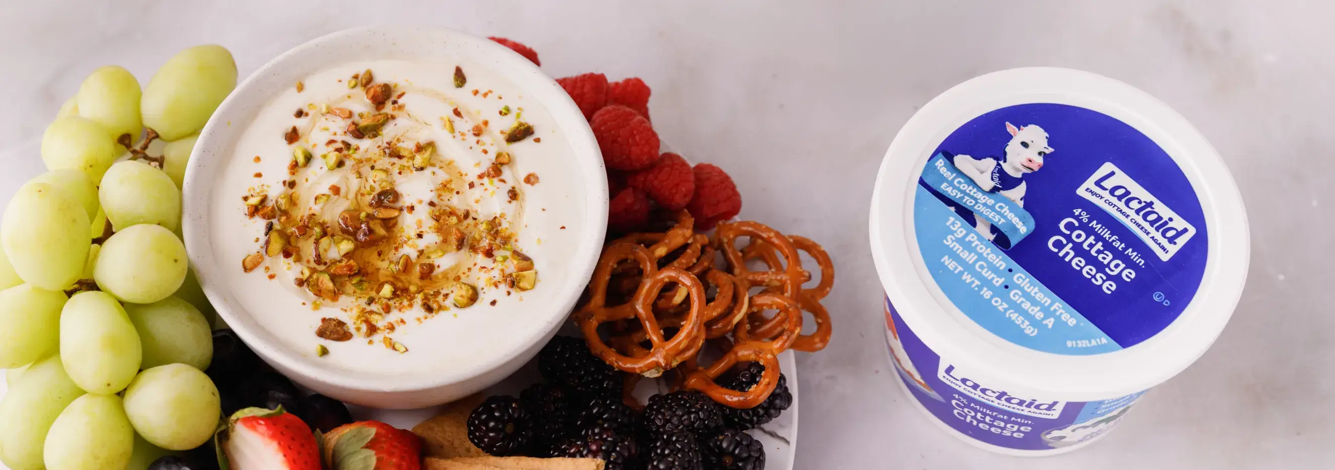 Delicious Lactaid® cottage cheese with fresh fruits and snacks