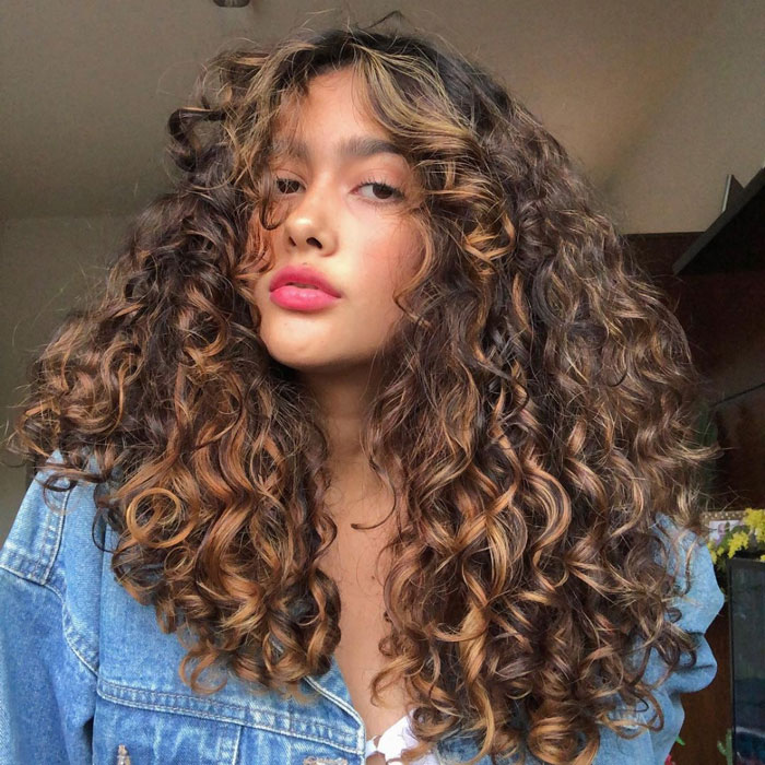 25 Photos That Will Make You Want Curly Bangs 