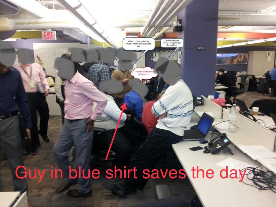 The guy in the blue shirt is under pressure during a production crisis