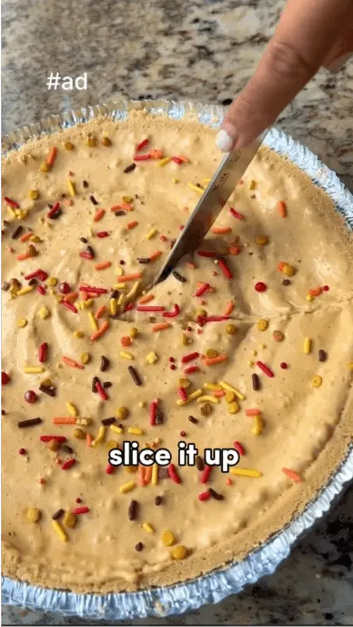 Creator slices a baked good made with premier pumpkin spice protein shake