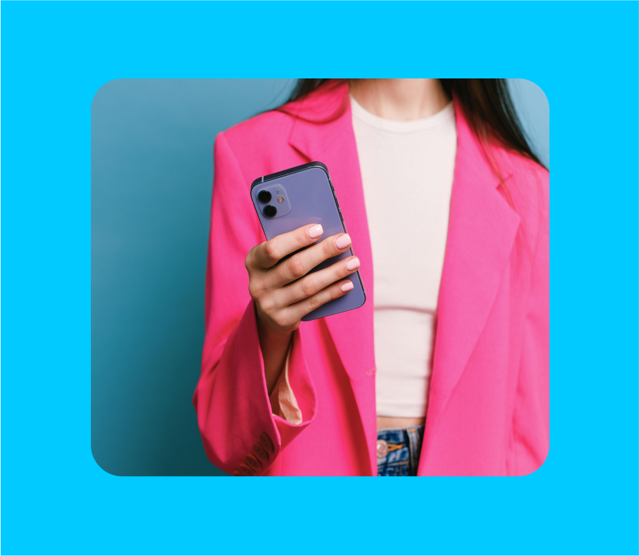 Image of a creator holding a phone