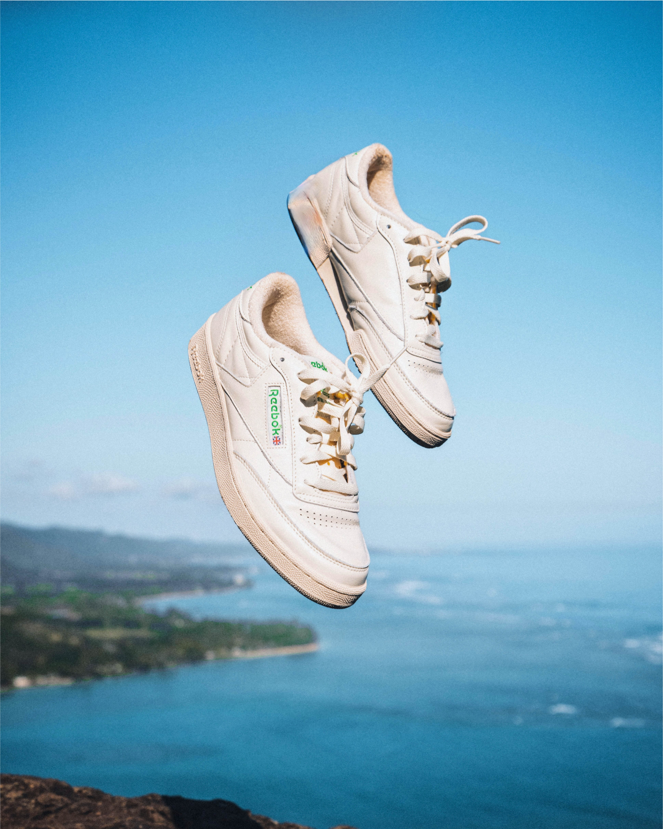Reebok Club C shoes next to key campaign stats