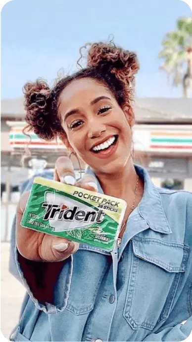 Creator poses with Trident pocket pack outside of 7 11