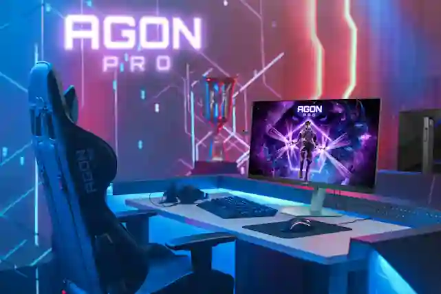 Agon Pro -pelinäyttö, kuvassa näyttö pöydällä, jonka edessä pelituoli. Taustalla pokaali.