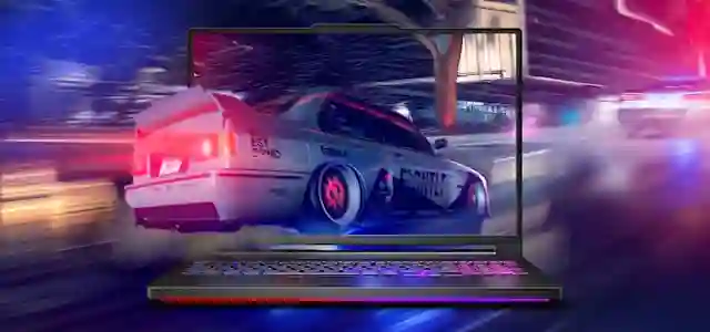 Kuvassa ralliautoajaa kovaa vauhtia tietokoneen näytöstä sisään.