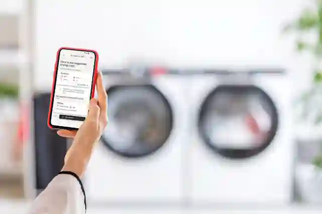 Hooverin pyykkikone ja kuivausrumpu synkronoituna, jolloin kuivausrumpu tietää millainen pyykkilasti tulossa.