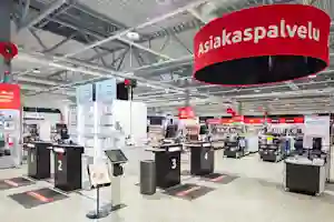 Raision myymälän asiakaspalvelutiski