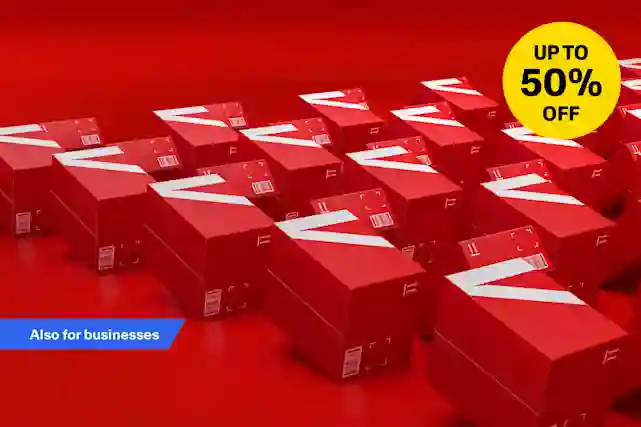 Rows of red Verkkokauppa.com boxes filled with sale items in a warehouse. Select products delivered in under an hour. Up to 50% off. Also available for businesses. Shop now!