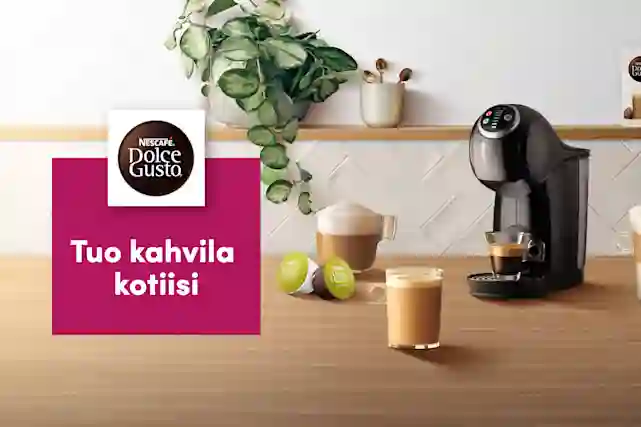 Nescafe Dolce Gusto -kapselikeitin kahville. Cappuccinoja kahvikupeissa. Teksti: Tuo kahvila kotiisi.
