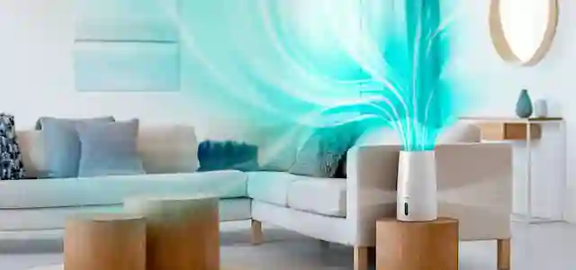 Ilmankostutin olohuoneessa. Kuvaan piirretty kosteuden kiertokulku huoneessa.