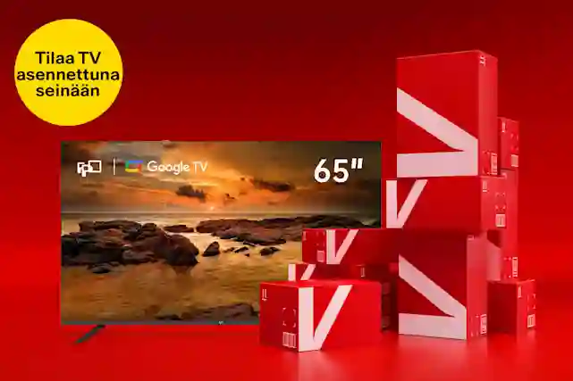 Varaston perukoilta edullinene TV punaisten Verkkokauppa.com pahvilaatikoiden vieressä. Keltainen pallura vieressä, jossa teksti:"Asennus seinälle 99,99 €". Osa tuotteista kulkeutuu kotiin toimitettuna tunnissa. Ostoksille!