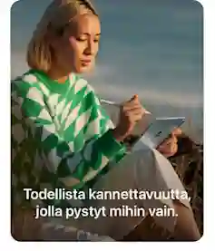 Nainen vihreässä kuvioneuleessa käyttää tablettia ulkona. Teksti: Todellista kannettavuutta, jolla pystyt mihin vain.