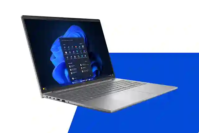 Kannettava tietokone, jonka näytöllä paljon aaltoilevia värejä