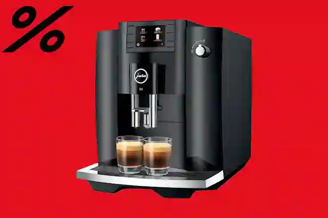 % -merkki ja keskellä kuvaa kahvikone. Ostoksille!