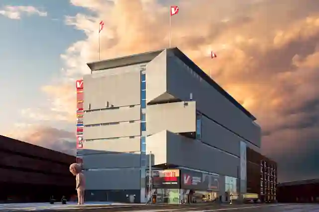 Verkkokauppa.com Helsingin myymälä Jätkäsaaressa. Pihalla Bad Bad Boy -veistos.