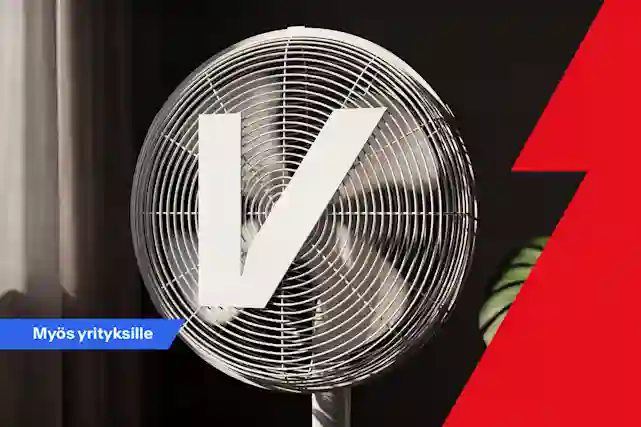 Pyöreä pöytätuuletin sisätilassa, tuulettimen edessä suuri valkoinen V‑kirjain. Vasemmassa alakulmassa sininen merkki tekstillä ”Myös yrityksille”, oikealla punainen graafinen muoto.