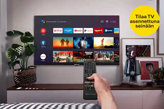 Olohuoneen valaisee tyylikkäästi Philips tv:n ambilight led taustavalot, jotka muuttuvat ruudun värien mukaan. Keltainene pallura, jossa teksti:"Asennus seinälle 99,99 €". Lue mikä televisio sopisi sinulle!