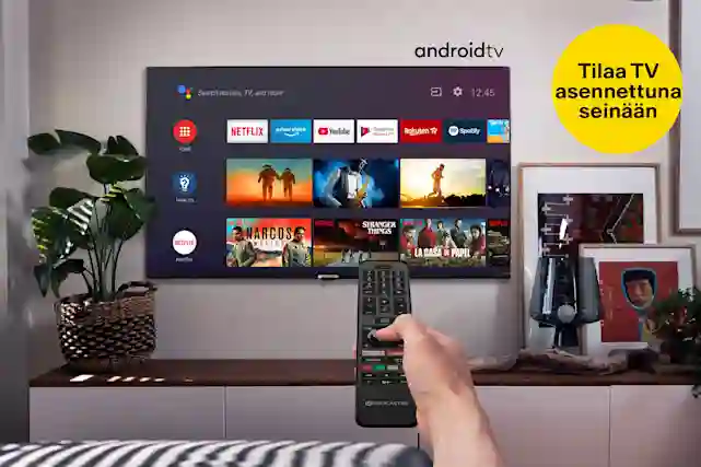 Olohuoneen valaisee tyylikkäästi Philips tv:n ambilight led taustavalot, jotka muuttuvat ruudun värien mukaan. Keltainene pallura, jossa teksti:"Asennus seinälle 99,99 €". Lue mikä televisio sopisi sinulle!