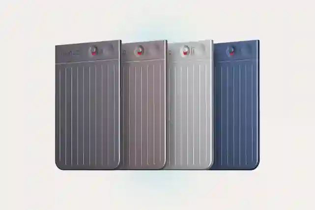 Four Plaud audio recorders in different colors: dark gray, brown, silver, and blue.