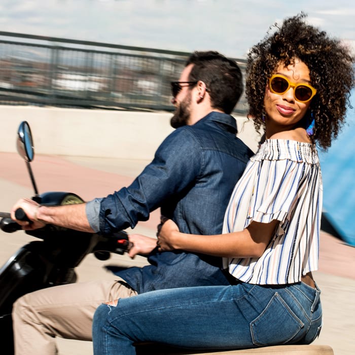 Couple on a moped