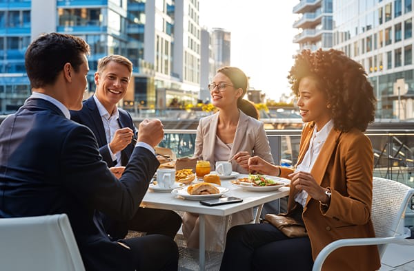 Coworkers having lunch outside