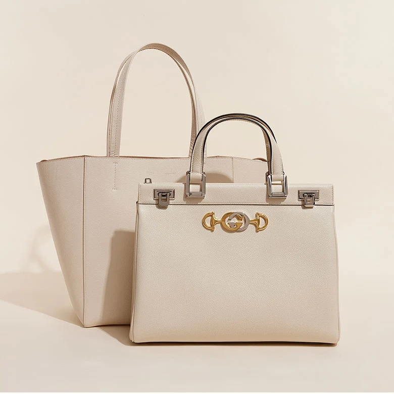 one Celine ivory color tote and one Gucci ivory color tote