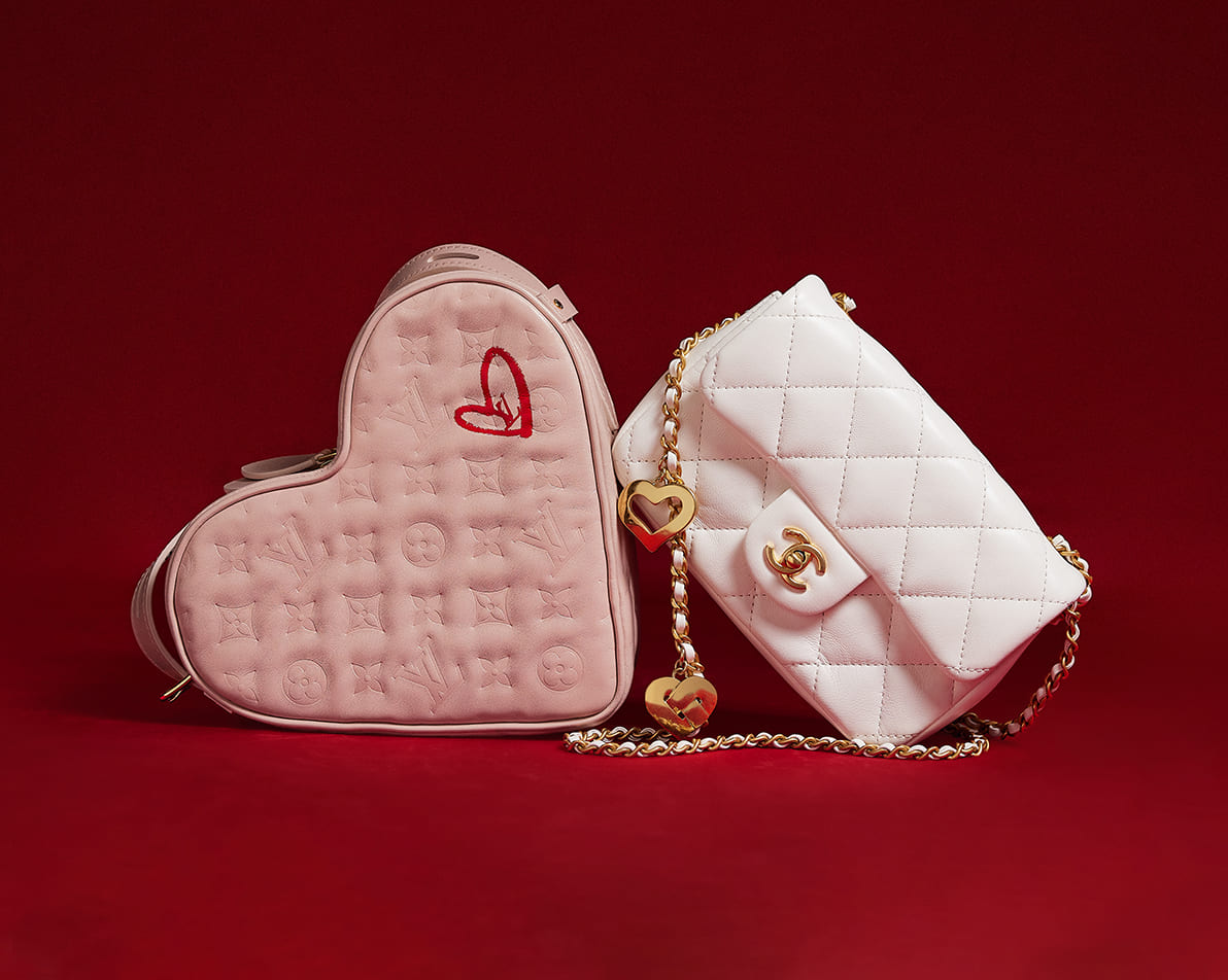 one light pink color Louis Vuitton heart shaped bag and one white color Chanel mini flap bag with a gold chain strap with heart shaped details